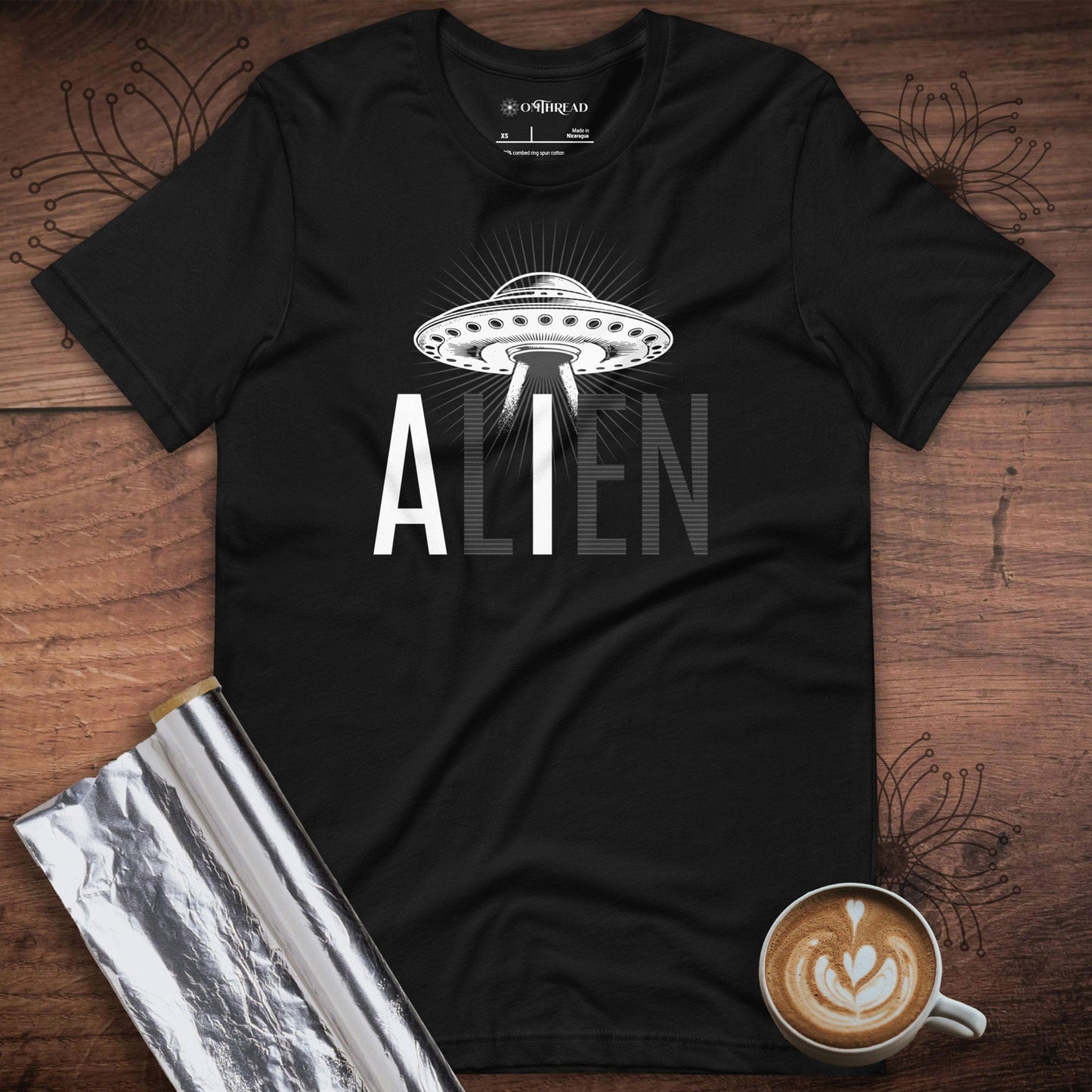 OMTHREAD black t-shirt with UFO spaceship and "ALIEN" text