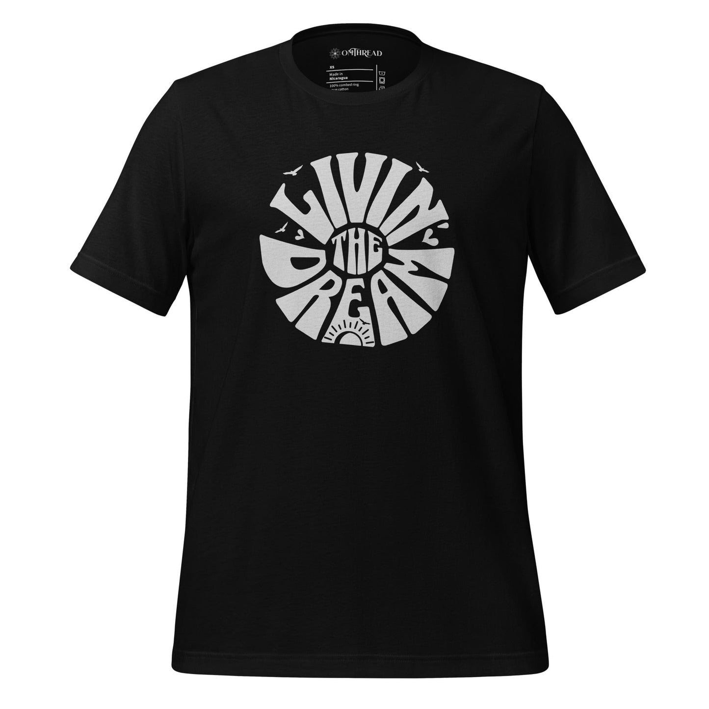 OMTHREAD black t-shirt featuring white retro-style typography reading "Livin' the Dream" in a circular design with sun, birds, and heart elements.