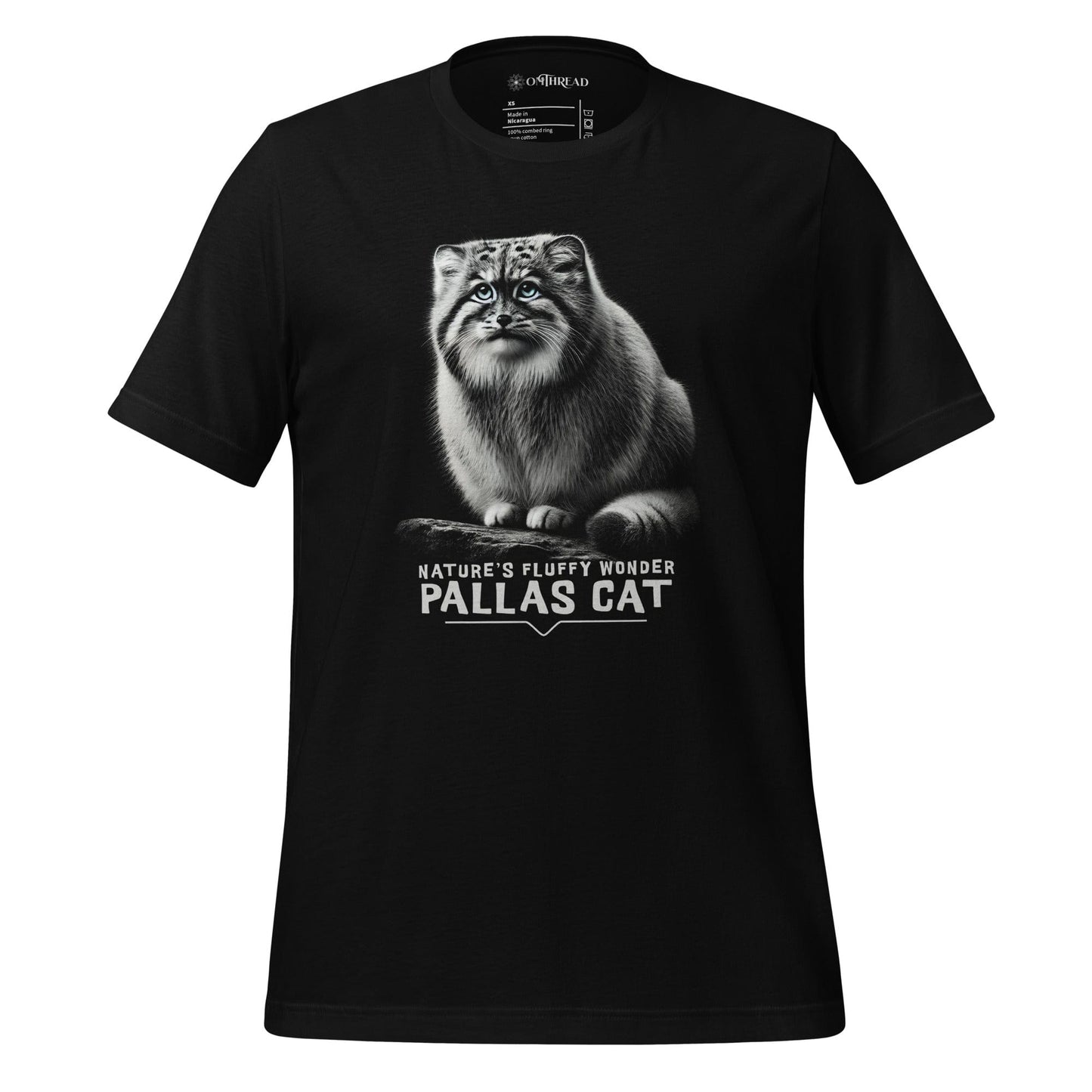 OMThread black t-shirt featuring a detailed black-and-white illustration of a Pallas cat with piercing blue eyes and dense fur. Below the image, "Nature’s Fluffy Wonder Pallas Cat" is written in bold, modern typography.