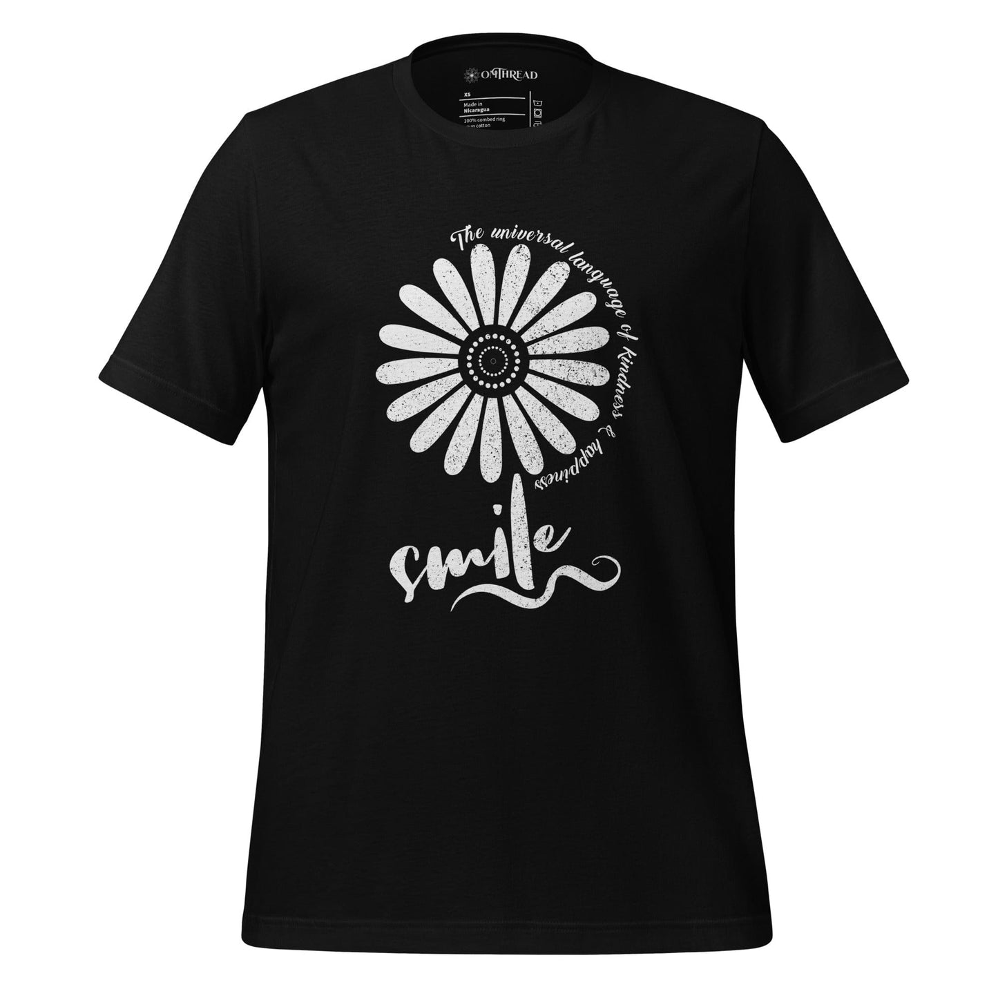OMTHREAD black t-shirt with a white floral design and the word "smile" in script, surrounded by the phrase "The universal language of kindness & happiness" in a circular pattern