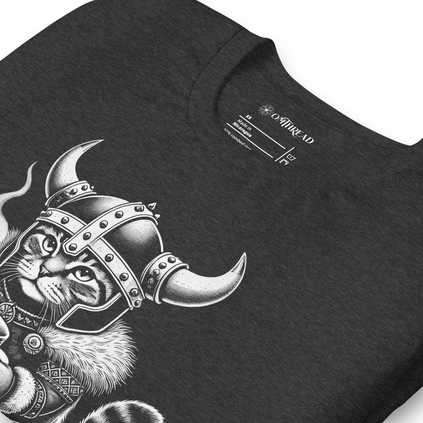 OMTHREAD dark gray t-shirt featuring a Viking cat in a horned helmet, gripping a steaming mug of coffee. The word 'Brewtality' is printed below in bold lettering. The feline wears Nordic-style armor with a fur cape.