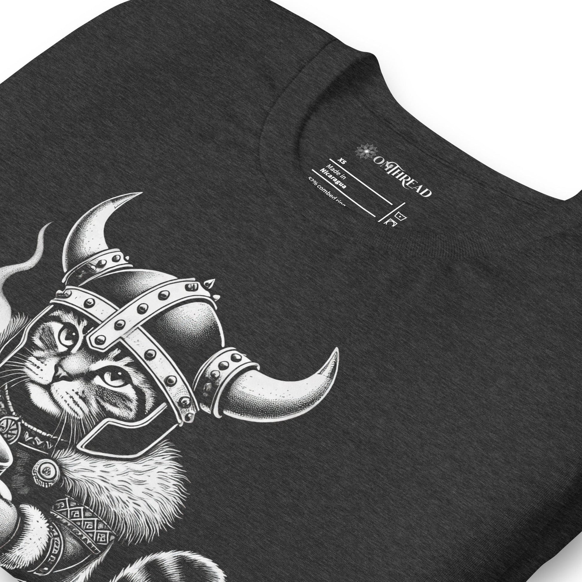 OMTHREAD dark gray t-shirt featuring a Viking cat in a horned helmet, gripping a steaming mug of coffee. The word 'Brewtality' is printed below in bold lettering. The feline wears Nordic-style armor with a fur cape.