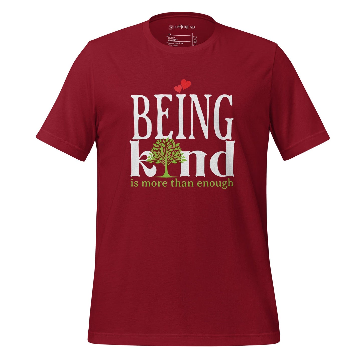 OMTHREAD cardinal red t-shirt with "BEING kind is more than enough" design featuring a tree with hearts.