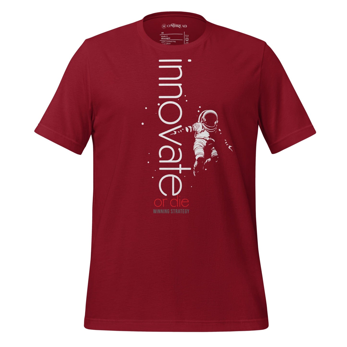 OMTHREAD cardinal red t-shirt featuring an astronaut floating in space with the words "Innovate or Die" in vertical typography, accented with red text.