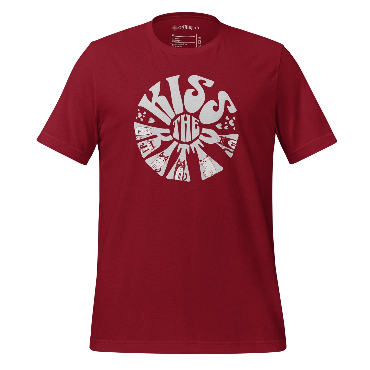 OMThread cardinal red t-shirt featuring a circular sunburst design with the phrase "Kiss the Kitty" in bold, retro-style lettering. The letters are integrated with playful cat illustrations, creating a dynamic composition.
