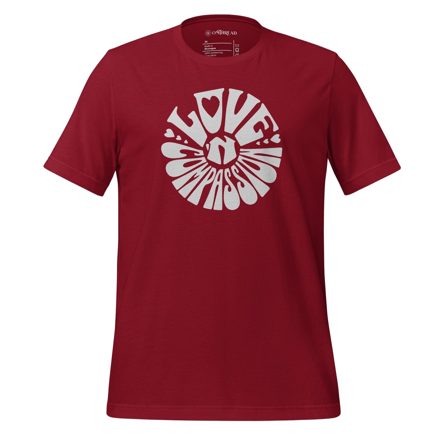 OMTHREAD red t-shirt with bold white "Love 'N Compassion" typography design in a circular layout