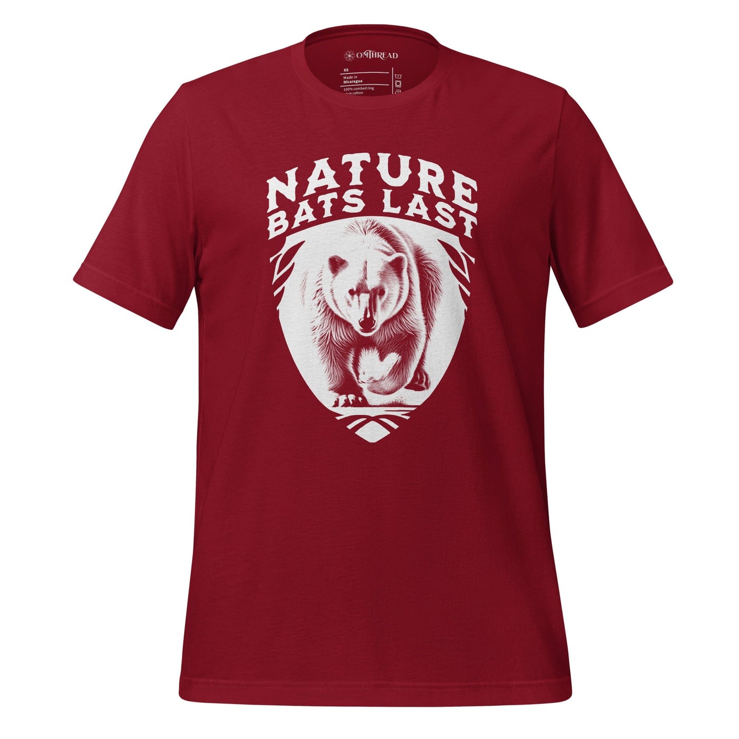 OMTHREAD Cardinal Red T-Shirt with a detailed polar bear illustration and bold "Nature Bats Last" text.