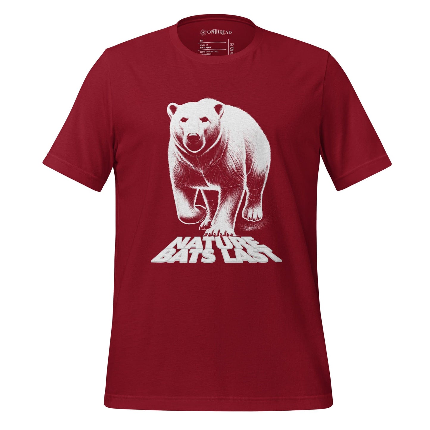 OMTHREAD cardinal red t-shirt featuring a detailed white illustration of a polar bear with the bold text "Nature Bats Last" beneath its paws.