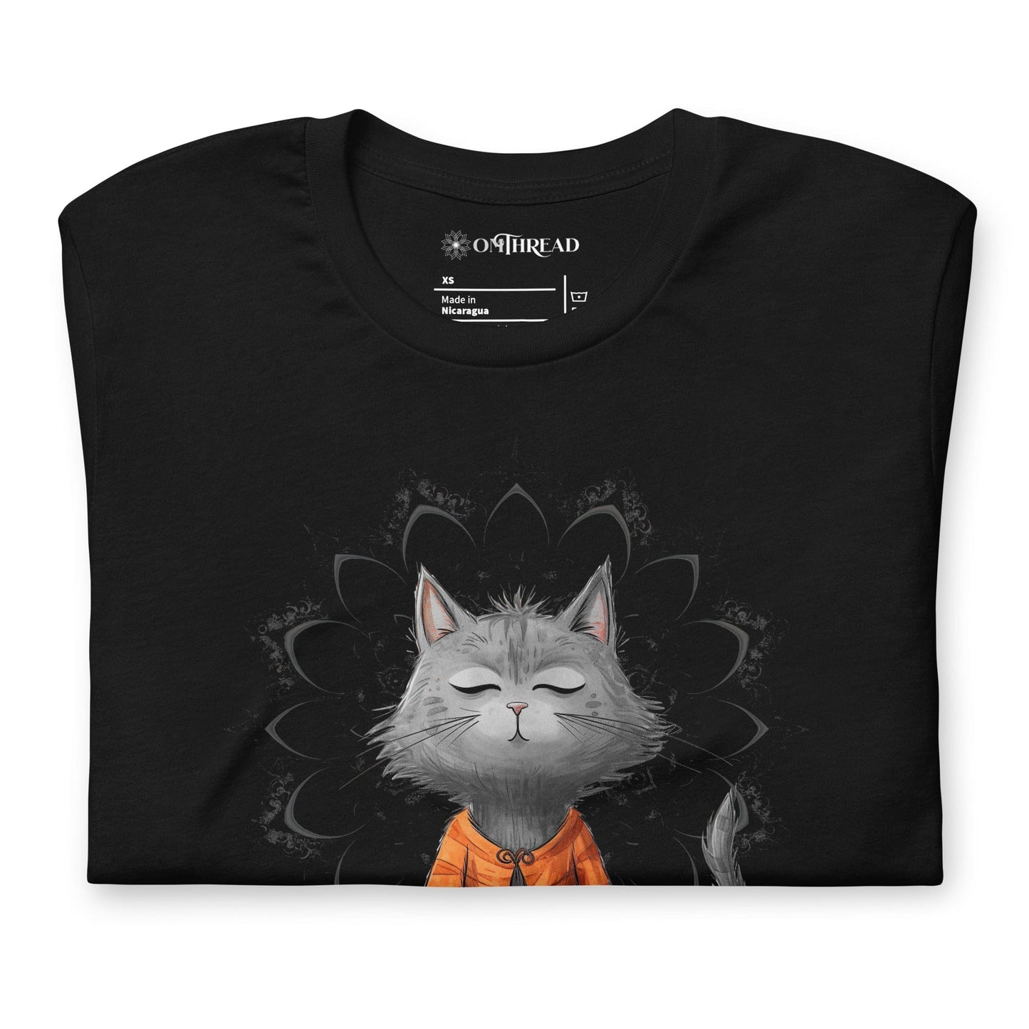 Black t-shirt featuring a meditating cat in a peaceful lotus pose, surrounded by a mandala-inspired design. Below the cat, the text reads 'Catching Peace' in bold typography. Ideal for yoga lovers, mindfulness seekers, and cat enthusiasts.