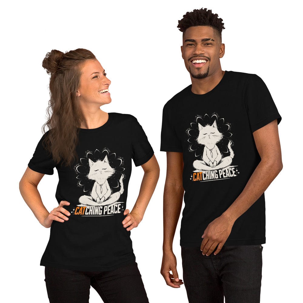 Black t-shirt featuring a meditating cat in a peaceful lotus pose, surrounded by a mandala-inspired design. Below the cat, the text reads 'Catching Peace' in bold typography. Ideal for yoga lovers, mindfulness seekers, and cat enthusiasts.