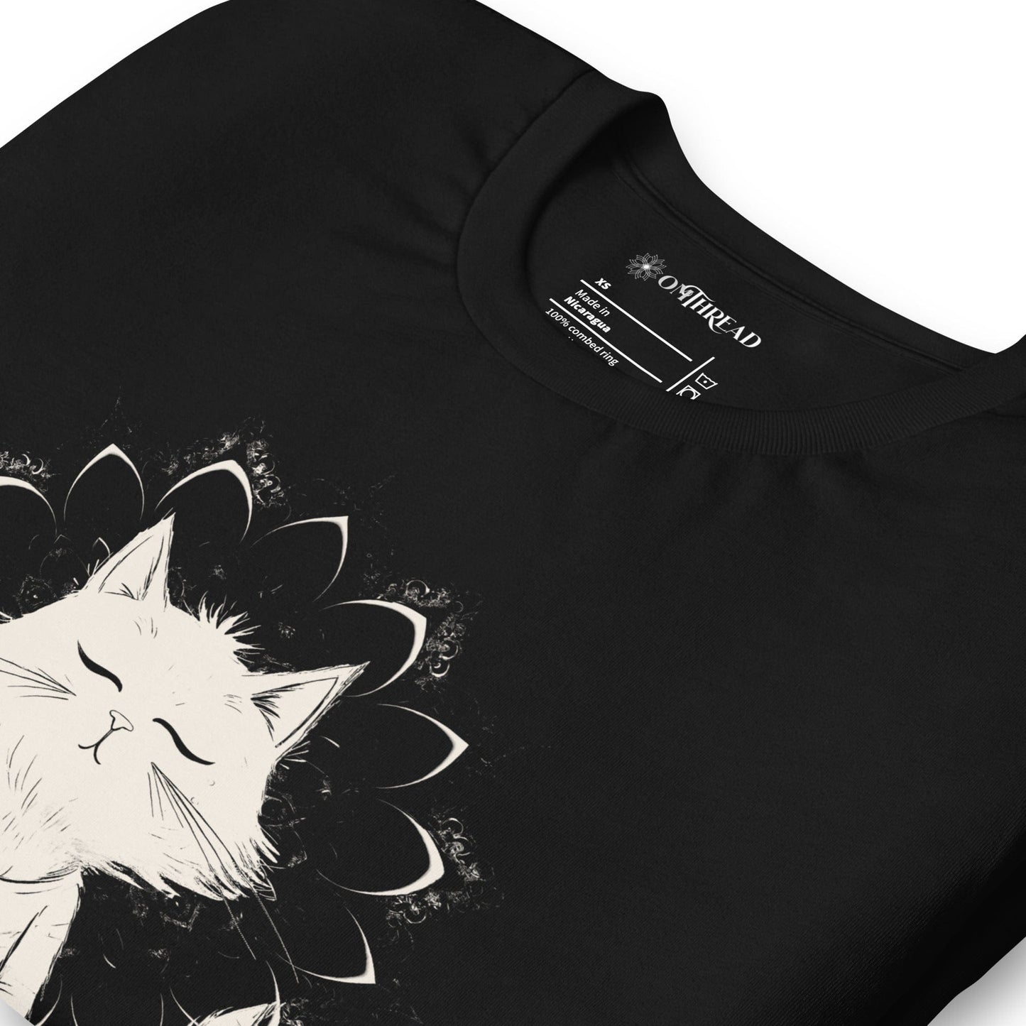 Black t-shirt featuring a meditating cat in a peaceful lotus pose, surrounded by a mandala-inspired design. Below the cat, the text reads 'Catching Peace' in bold typography. Ideal for yoga lovers, mindfulness seekers, and cat enthusiasts.