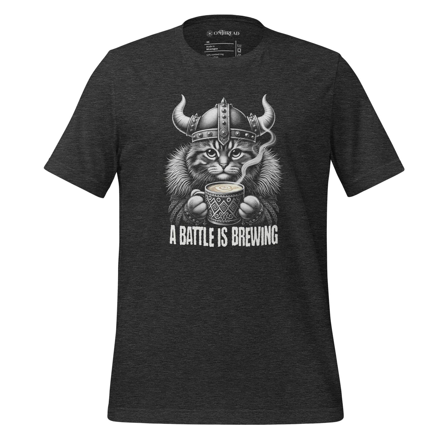 OMTHREAD A Battle Is Brewing Viking Cat Dark gray T-Shirt featuring a fierce feline in Norse warrior gear holding a steaming cup of coffee. Perfect for coffee lovers, cat enthusiasts, and Viking mythology fans. Soft cotton unisex tee.