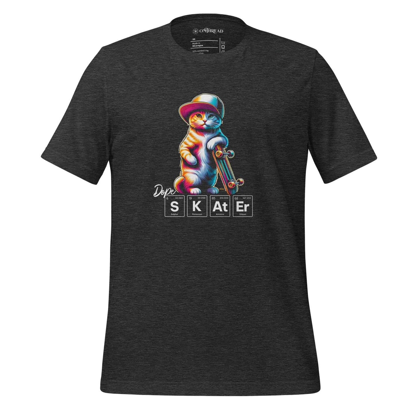OMTHREAD dark gray t-shirt featuring a colorful illustration of a cat wearing a hat and holding a skateboard. Below the cat, the word "SKATER" is spelled out using periodic table elements: sulfur (S), potassium (K), astatine (At), and erbium (Er).