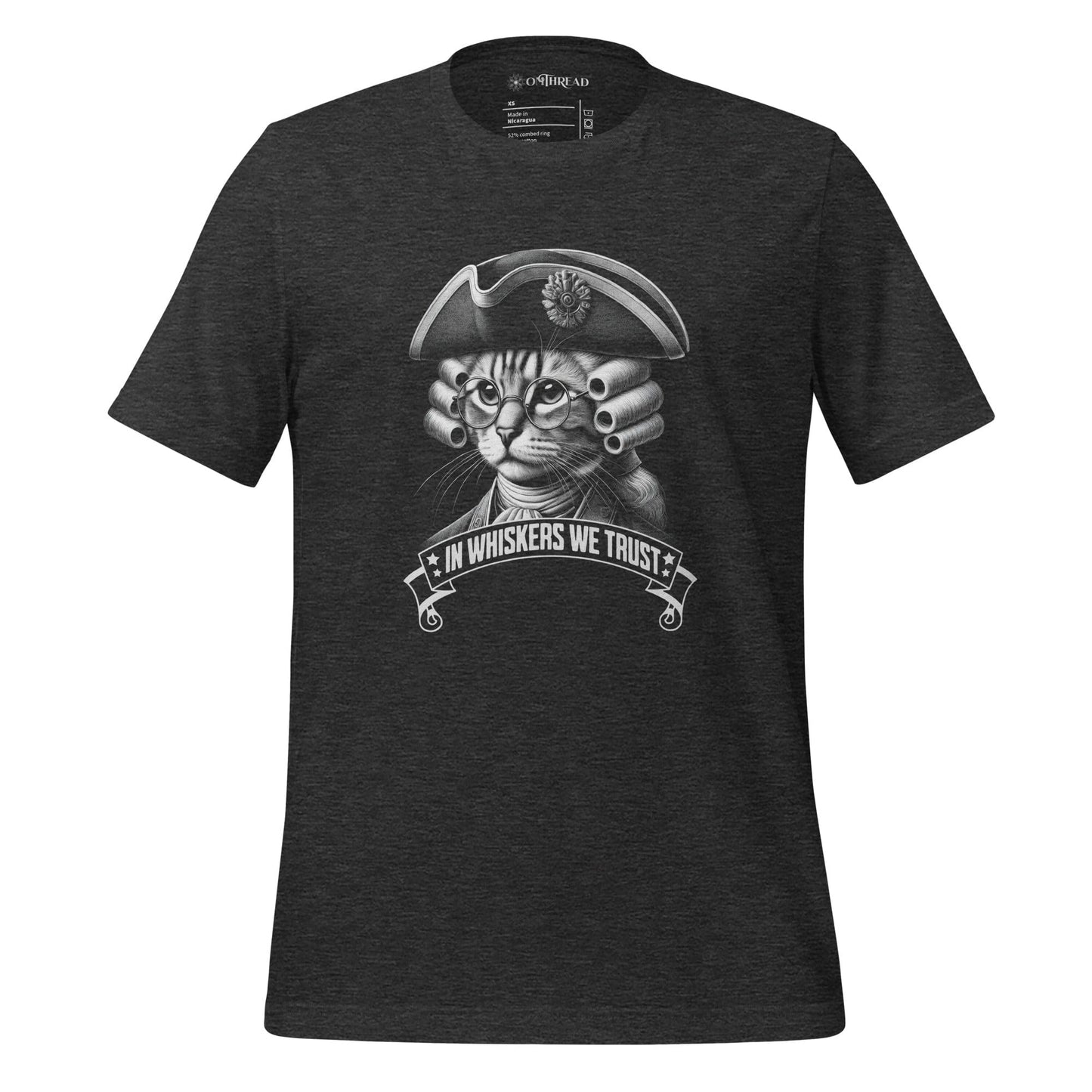 OMTHREAD dark gray t-shirt featuring a detailed cat illustration dressed in colonial attire, wearing a tricorn hat, glasses, and a powdered wig. The design includes the phrase 'In Whiskers We Trust' in a bold banner.