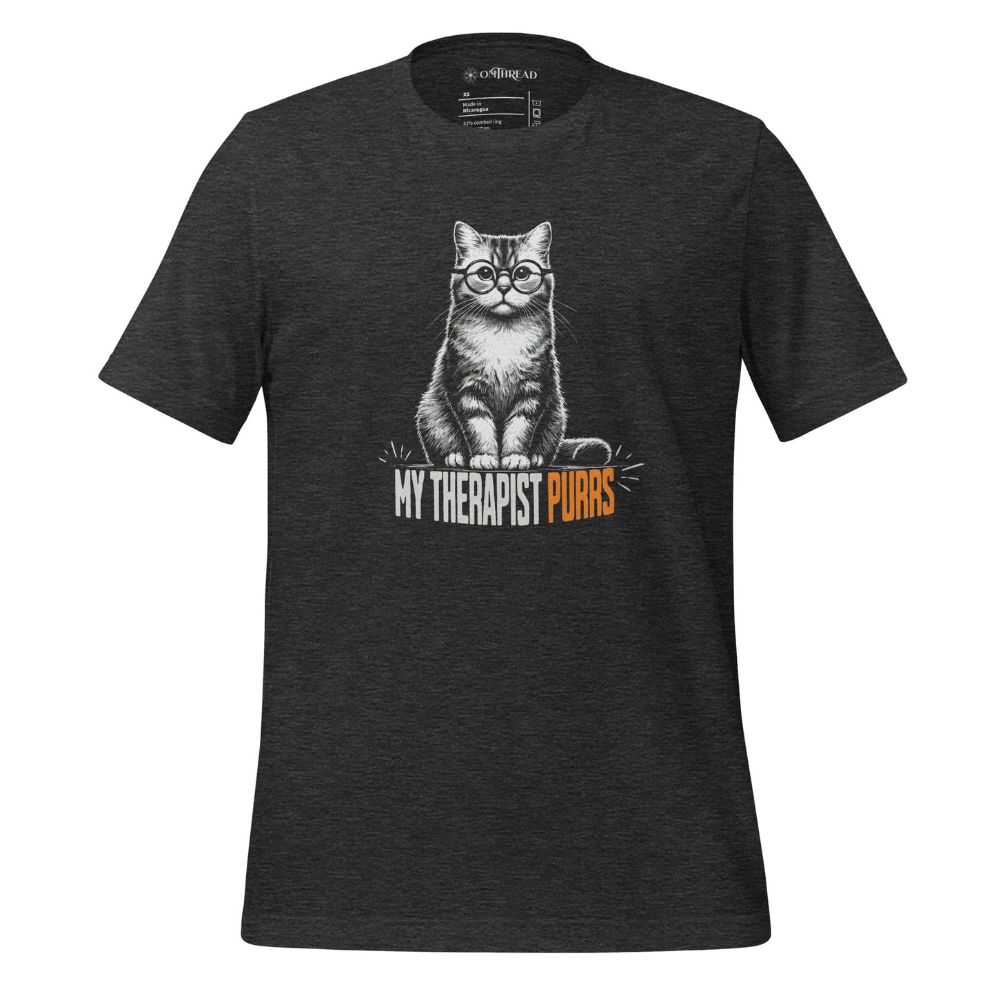 OMTHREAD dark gray t-shirt featuring an illustrated cat wearing round glasses, sitting upright with a calm expression. Below the cat, bold text reads "My Therapist Purrs," with "Purrs" highlighted in orange.