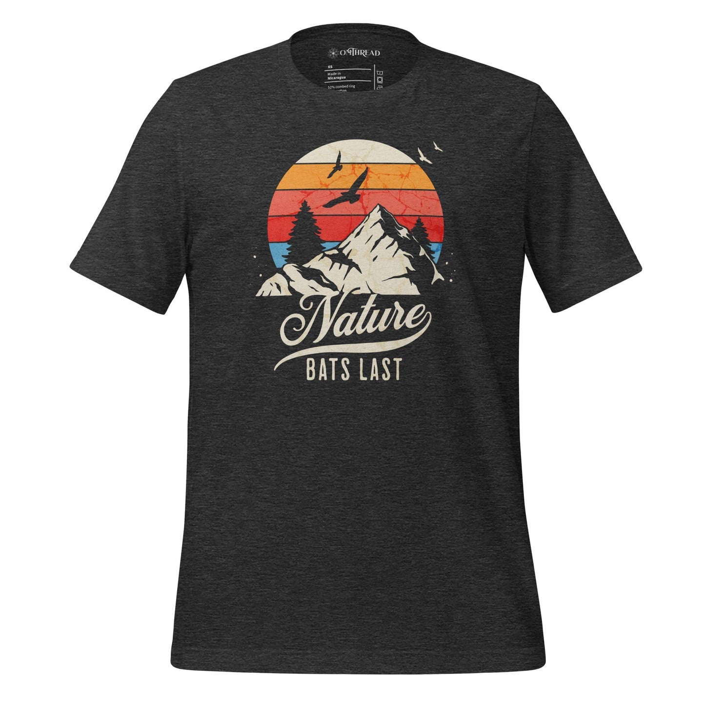 OMThread dark gray t-shirt featuring a retro-style mountain landscape with a sunset and birds in flight, displaying the phrase "Nature Bats Last" in vintage typography.