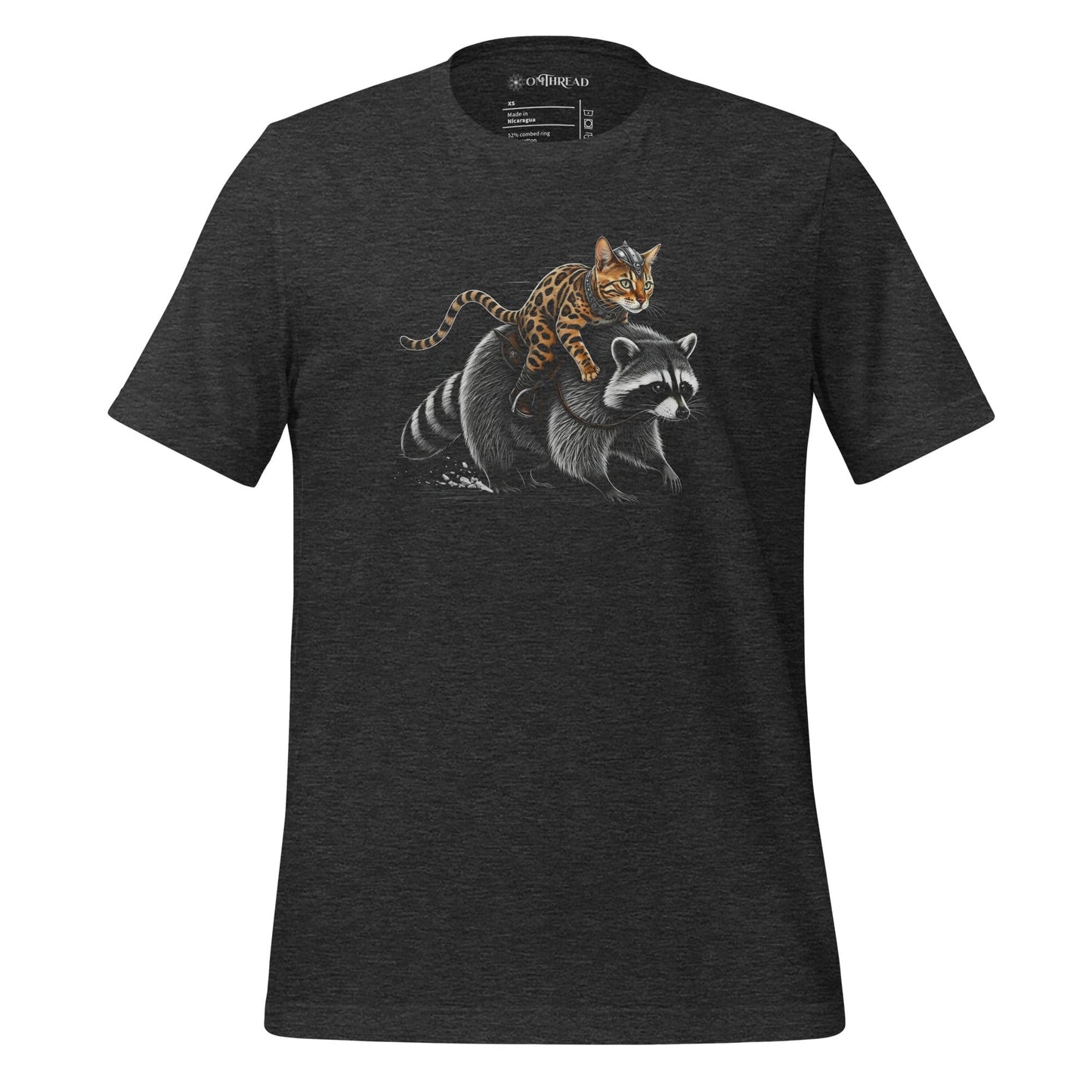 OMTHREAD dark gray t-shirt featuring a Viking warrior cat with Nordic markings riding a determined raccoon. The feline has a fierce expression, gripping the raccoon's fur, while the raccoon strides forward with focus.
