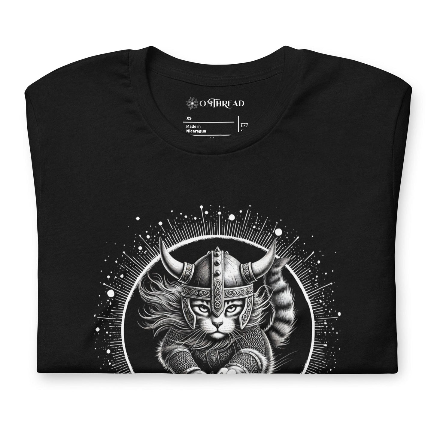 Black t-shirt featuring a Viking cat warrior leaping forward, wearing a horned helmet and armor, set against a cosmic circular background with radiant lines.