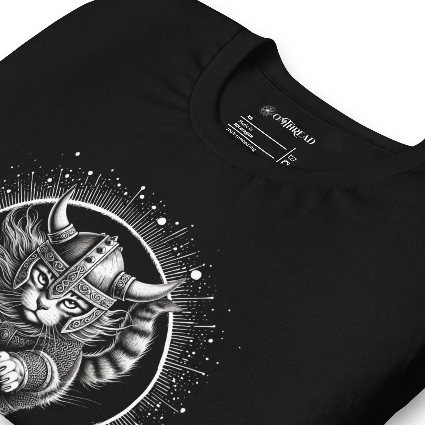 Black t-shirt featuring a Viking cat warrior leaping forward, wearing a horned helmet and armor, set against a cosmic circular background with radiant lines.