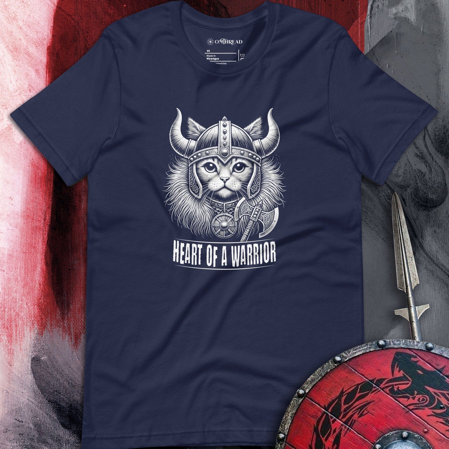 OMTHREAD Heart of a Warrior Viking Cat navy T-Shirt featuring a fierce cat in Norse warrior attire with a helmet and axe, showcasing a bold Viking-inspired graphic design.