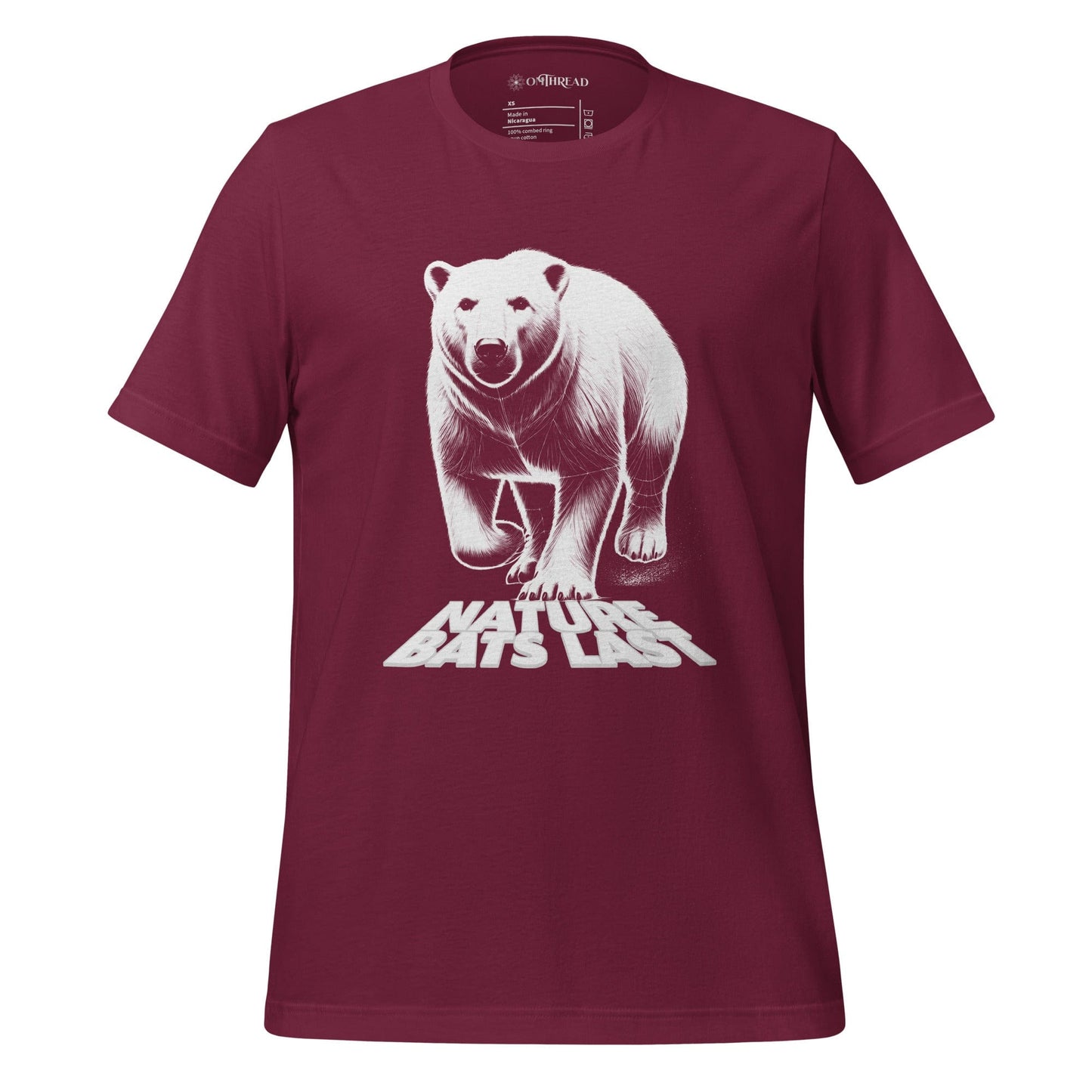 OMTHREAD maroon t-shirt featuring a detailed white illustration of a polar bear with the bold text "Nature Bats Last" beneath its paws.