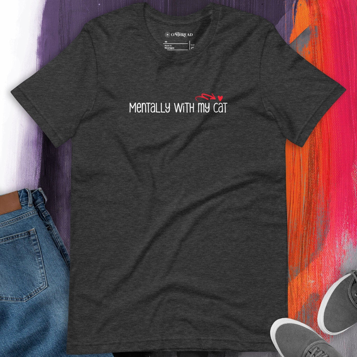OMThread Mentally With My Cat dark gray t-shirt featuring minimalist white text with a small red heart and a swirl above the word "cat."