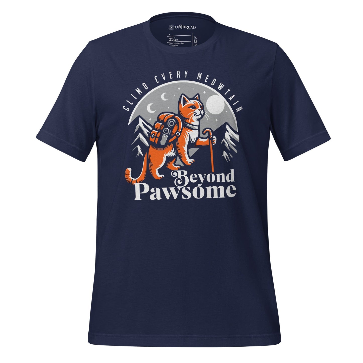 OMThread navy t-shirt featuring an adventurous orange cat with a backpack and hiking stick. The cat stands against a mountain and moonlit night backdrop. The design includes the text "Climb Every Meowntain" above and "Beyond Pawsome" below.