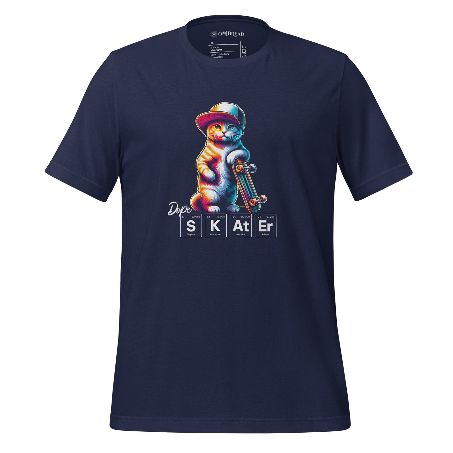OMTHREAD navy blue t-shirt featuring a colorful illustration of a cat wearing a hat and holding a skateboard. Below the cat, the word "SKATER" is spelled out using periodic table elements: sulfur (S), potassium (K), astatine (At), and erbium (Er).