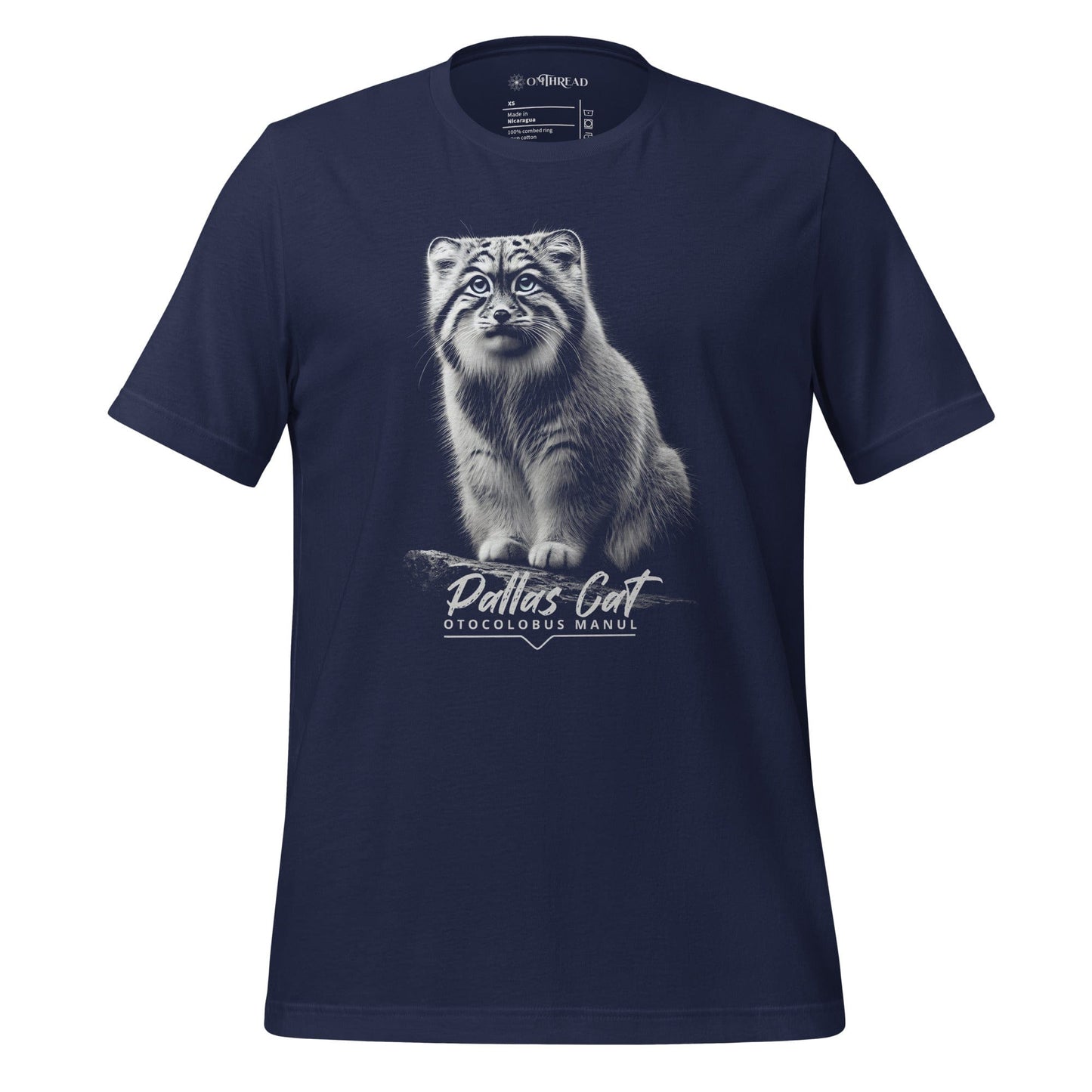 OMThread navy blue t-shirt featuring a detailed black-and-white illustration of a Pallas cat sitting on a branch. The cat has intense eyes and finely detailed fur. Below the image, "Pallas Cat" is written in an elegant script, with "Otocolobus Manul" in a modern font.