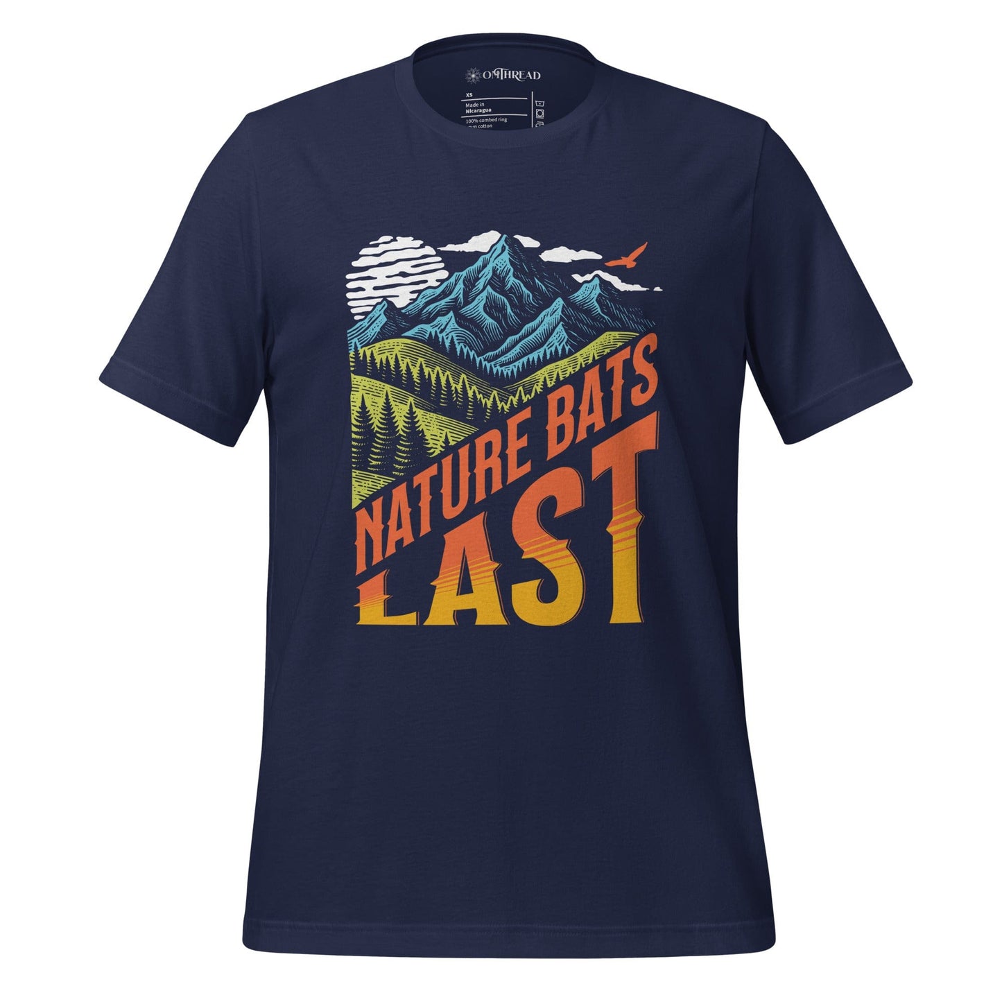 OMThread navy t-shirt featuring a bold "Nature Bats Last" design with stylized mountains, forests, and a sunset gradient. High-contrast typography with an outdoor adventure and climate awareness theme.