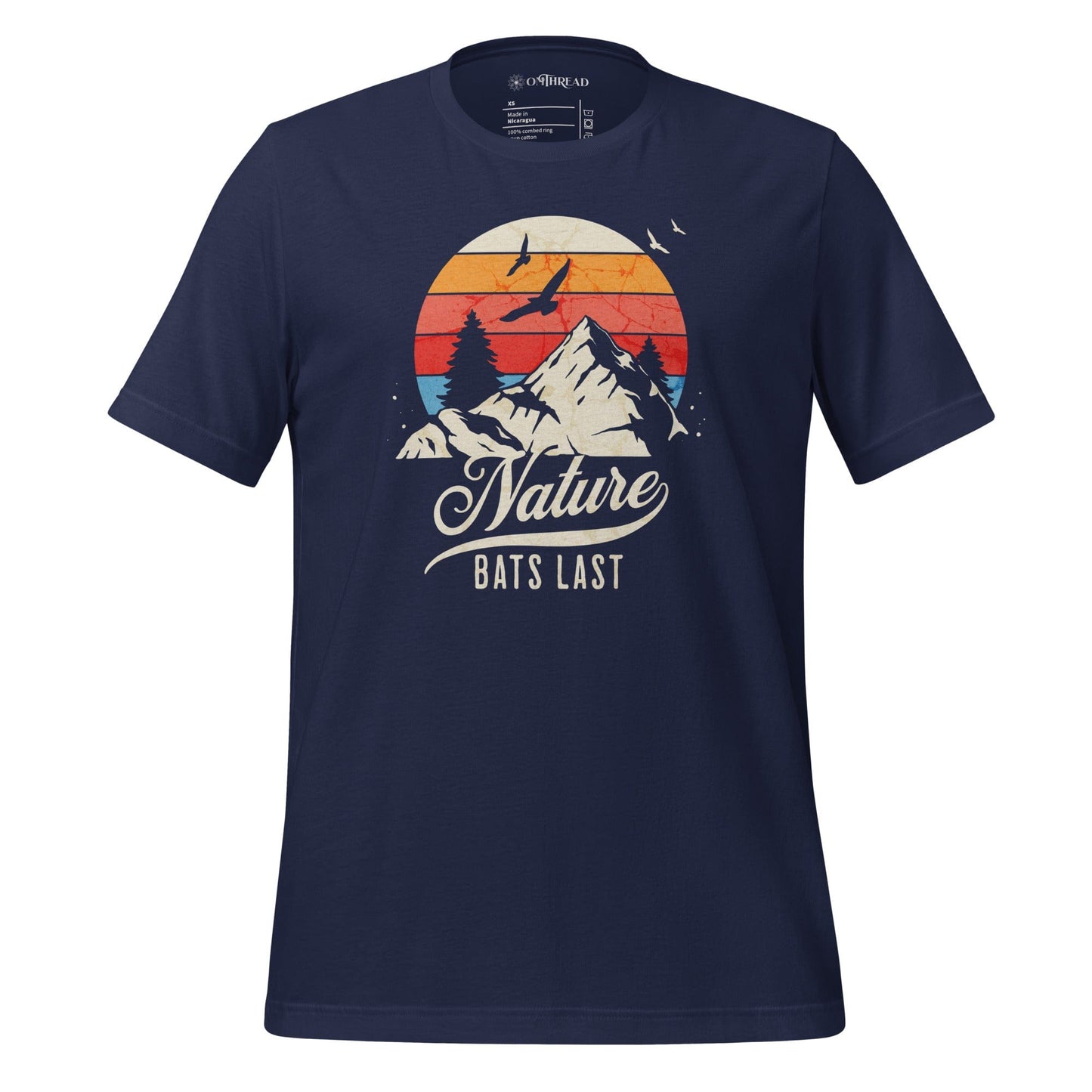 OMThread navy blue t-shirt featuring a retro-style mountain landscape with a sunset and birds in flight, displaying the phrase "Nature Bats Last" in vintage typography.