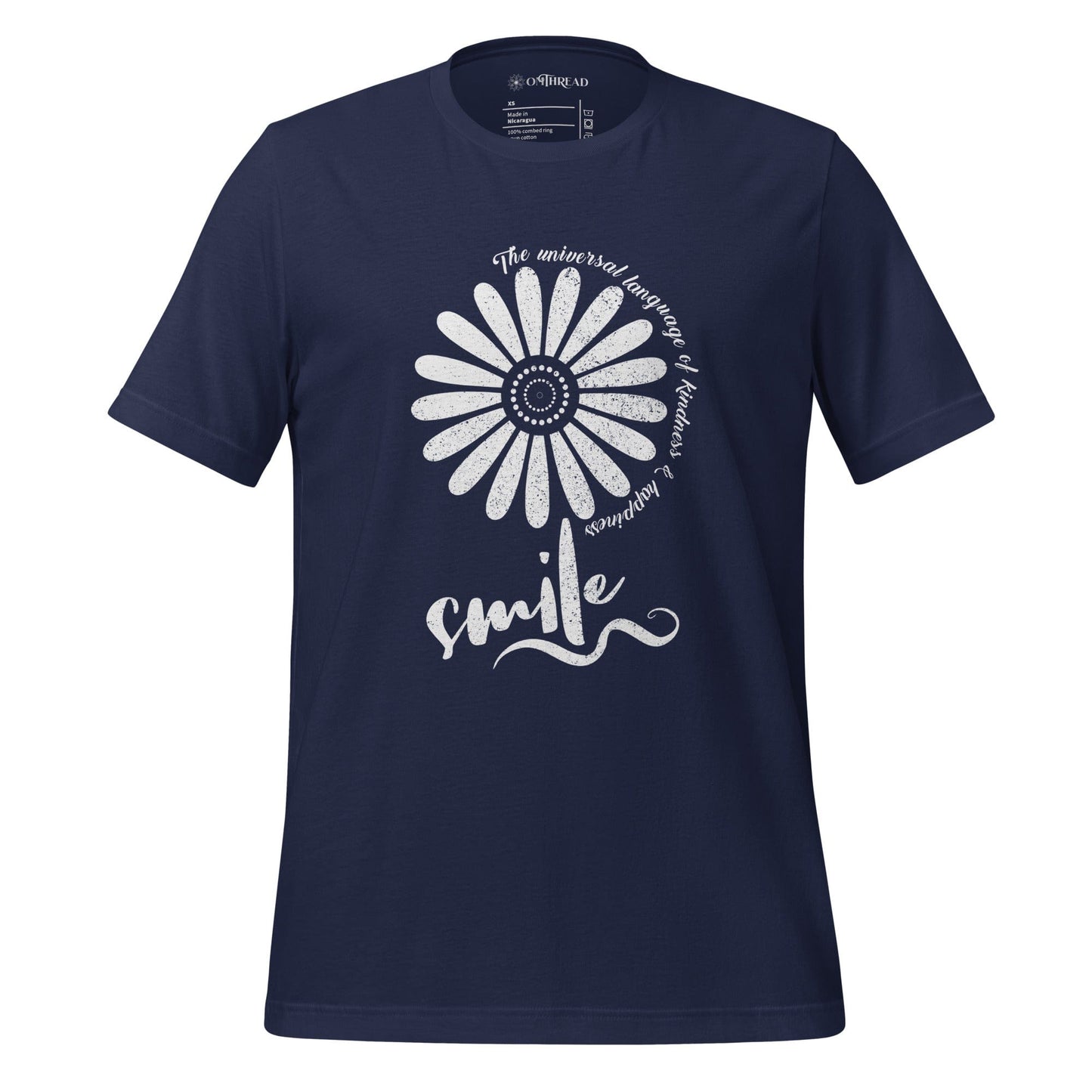 OMTHREAD navy t-shirt with a white floral design and the word "smile" in script, surrounded by the phrase "The universal language of kindness & happiness" in a circular pattern