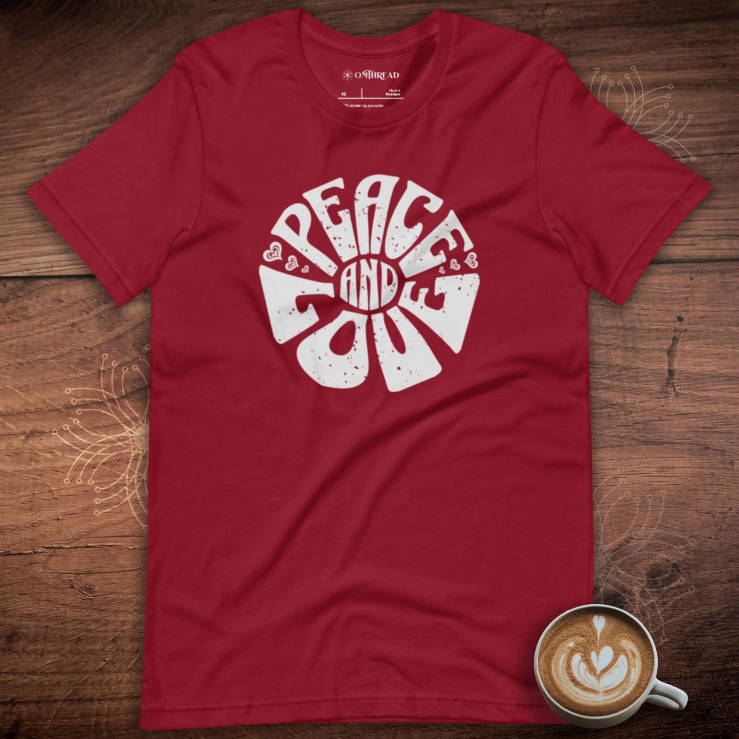 OMTHREAD red peace and love t-shirt with bold vintage typography and heart accents.