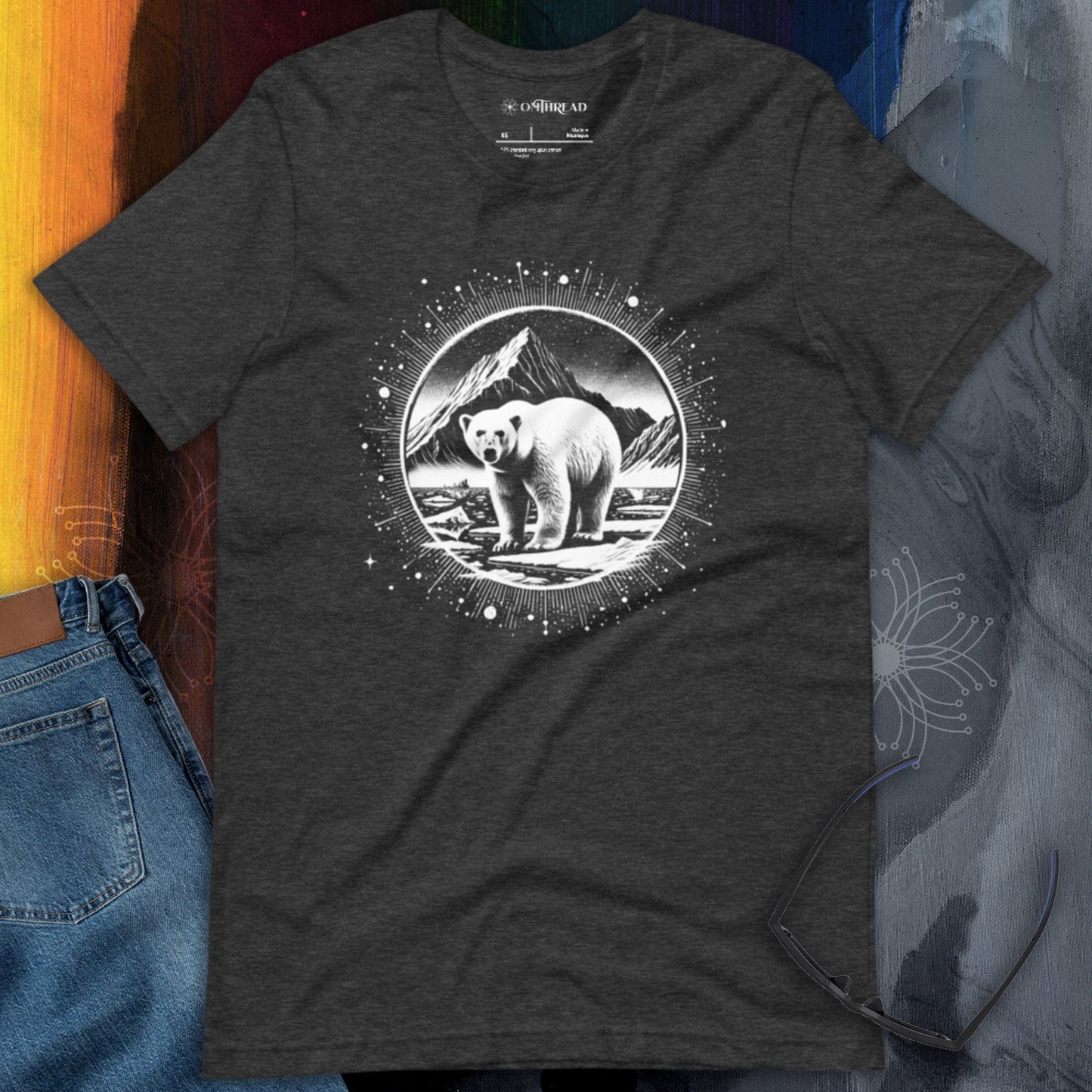 OMTHREAD dark grey heather t-shirt featuring a detailed black and white illustration of a polar bear standing in an Arctic landscape, framed by a circular cosmic halo design.