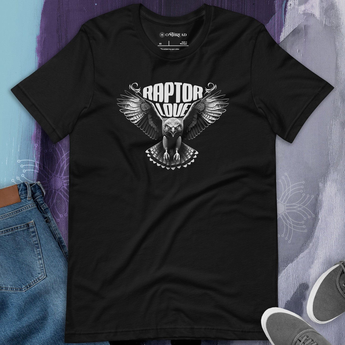 OMTHREAD black t-shirt with a detailed raptor design featuring a hawk in mid-flight with outstretched wings and the bold text "Raptor Love" above.