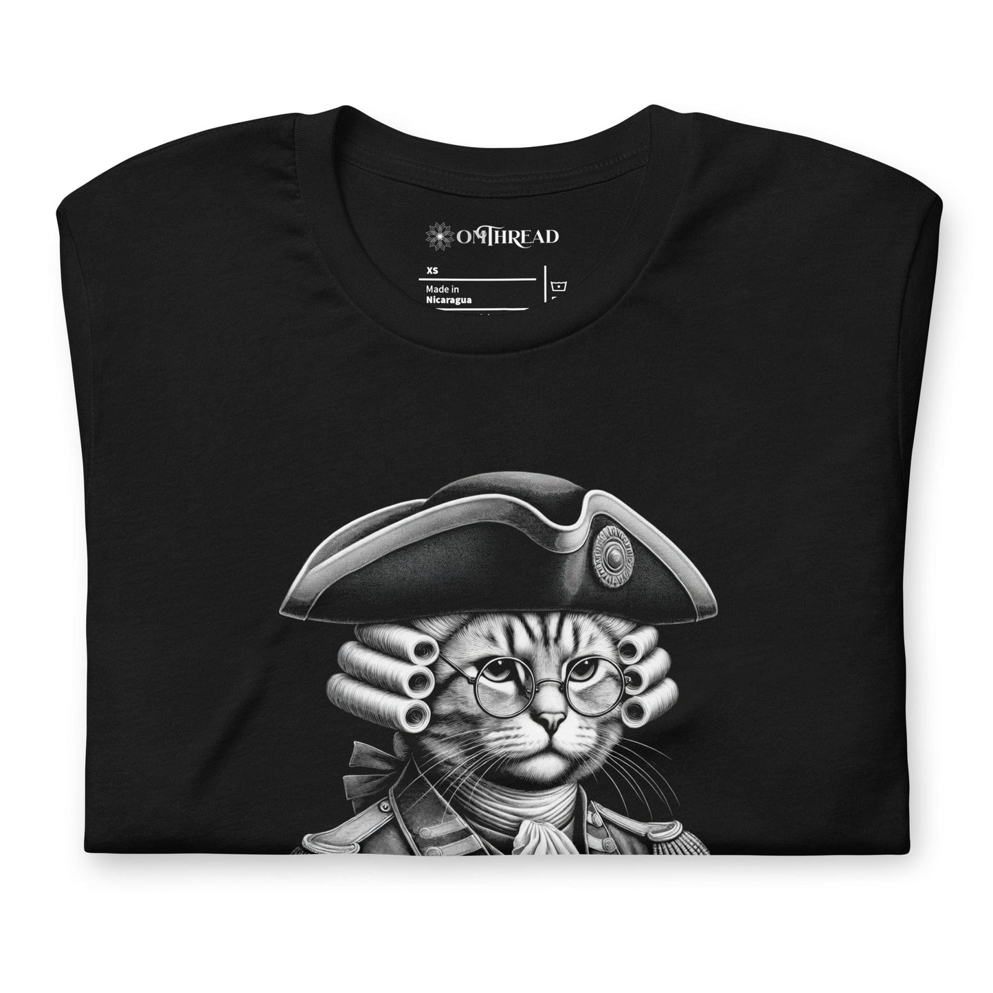 Black t-shirt featuring a colonial-style cat in 18th-century revolutionary attire, complete with a powdered wig and glasses. The banner below reads 'The Right to Purr and Bear Claws' in bold lettering, surrounded by stars.