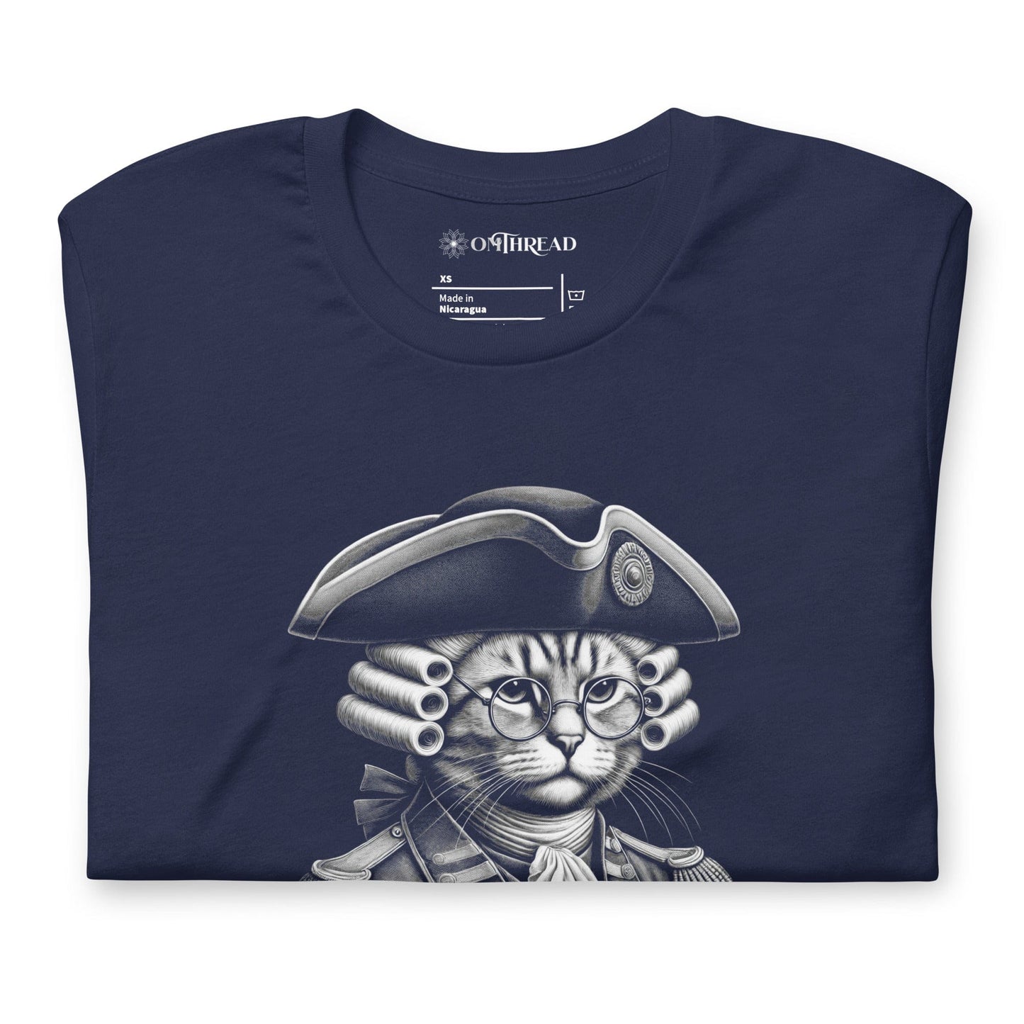Navy blue t-shirt featuring a colonial-style cat in 18th-century revolutionary attire, complete with a powdered wig and glasses. The banner below reads, The Right to Purr and Bear Claws in bold lettering, surrounded by stars.