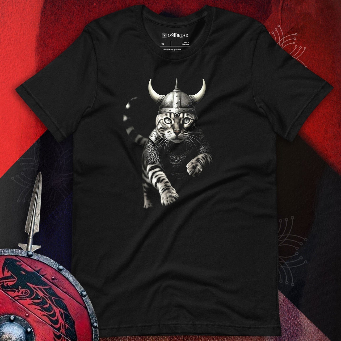 OMTHREAD black t-shirt featuring a detailed illustration of a Viking cat wearing armor and a horned helmet, mid-stride as if leaping into action.