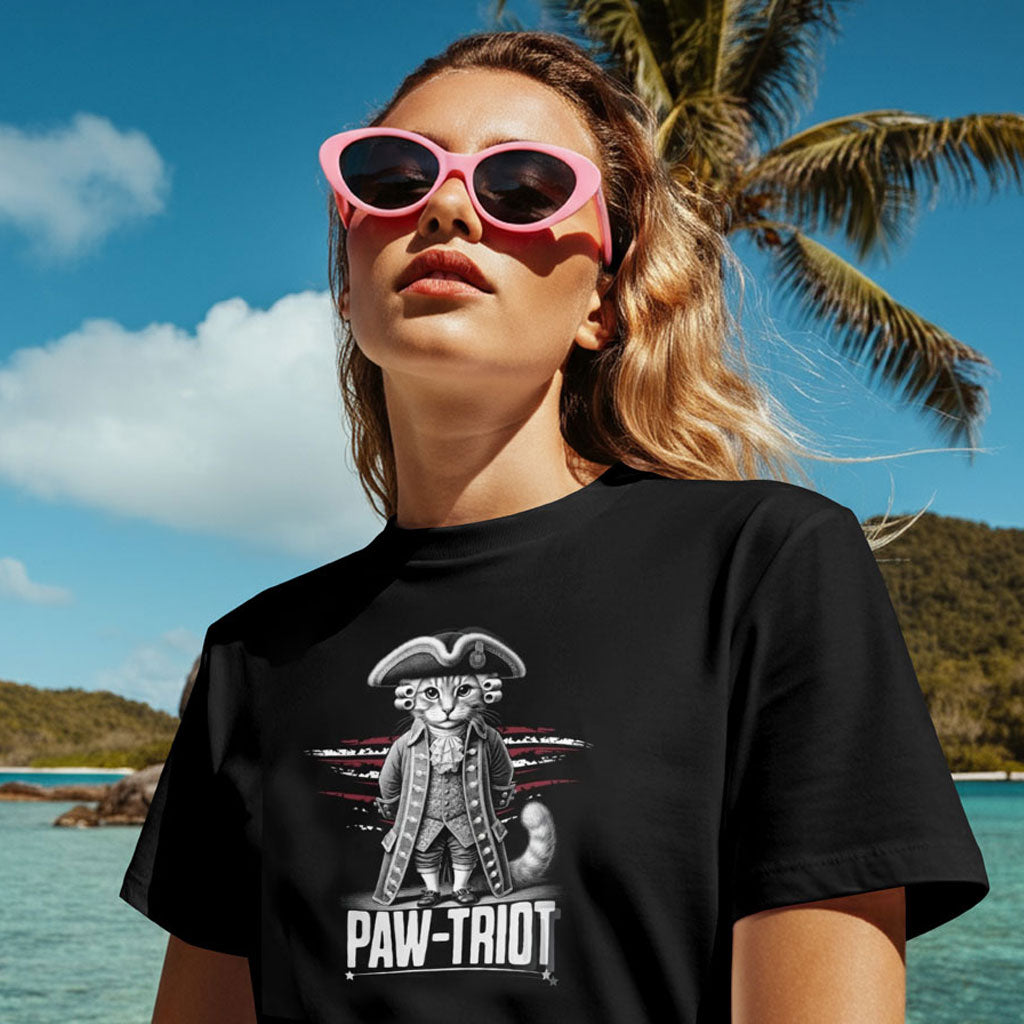 OMThread black colonial patriotic cat t-shirt featuring a Paw-triot cat dressed in 18th-century colonial attire worn by a model outdoors