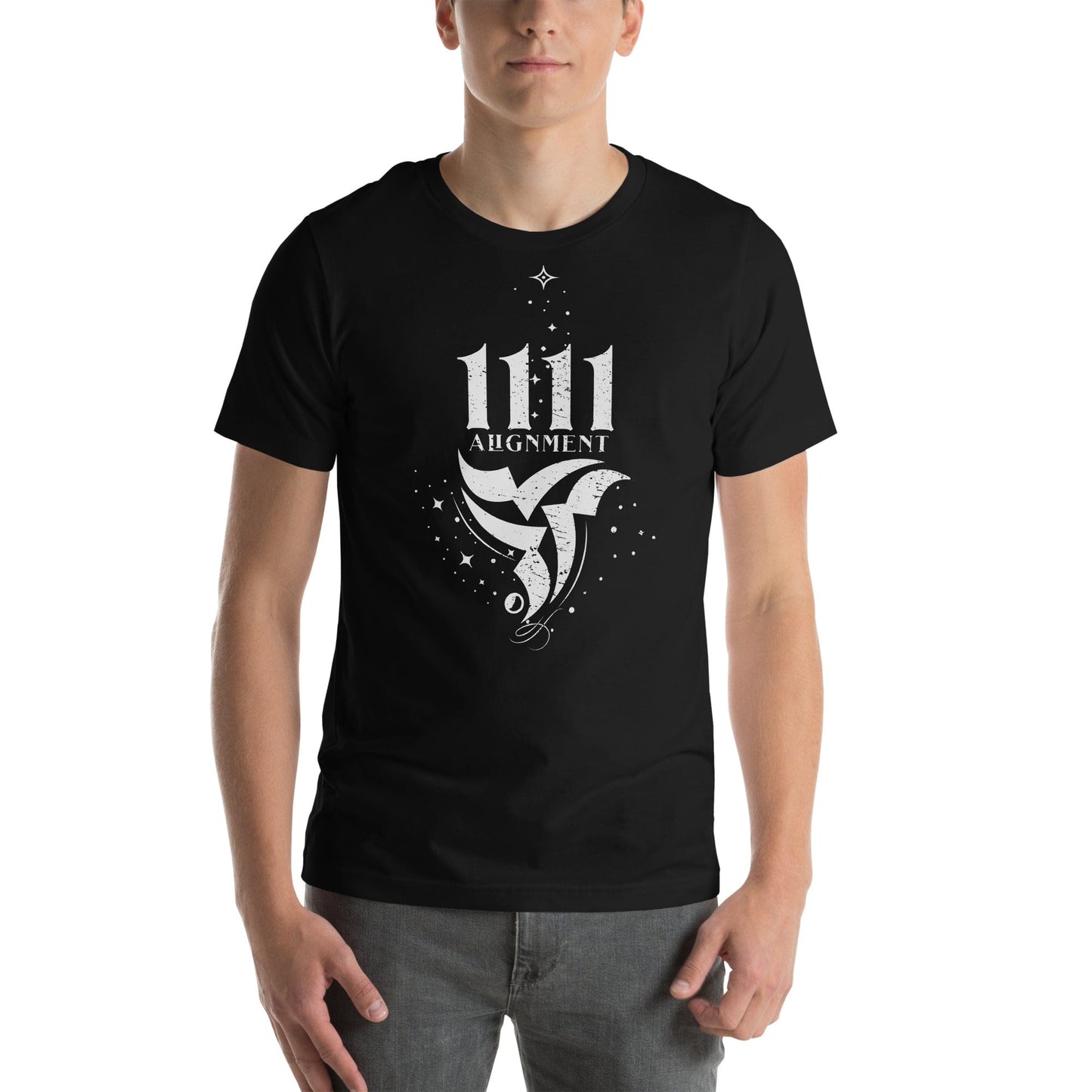 Man model wearing a black t-shirt with a white graphic design featuring the number 1111 above the word 'Alignment' and an abstract bird-like symbol surrounded by stars and cosmic elements