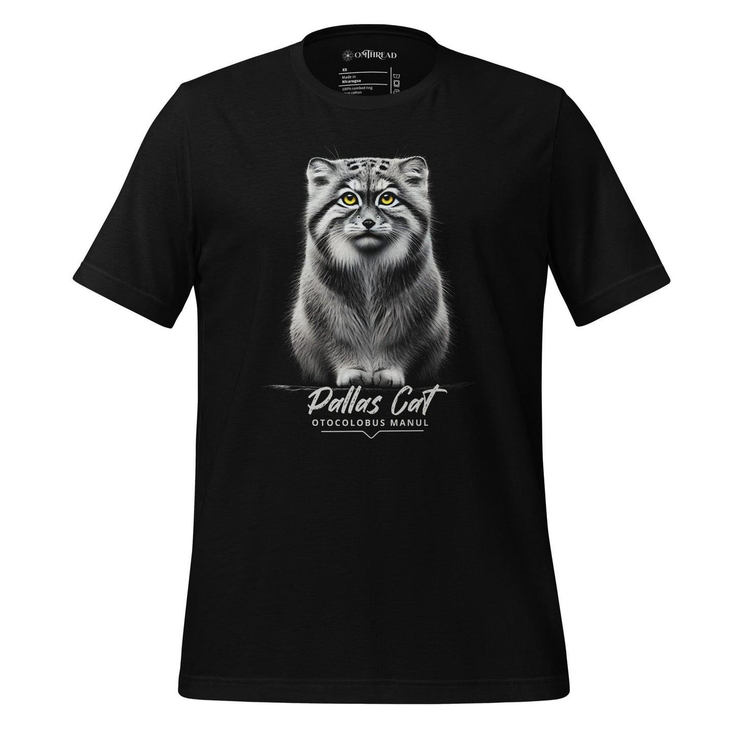 Black t-shirt featuring a realistic illustration of a Pallas cat with bright yellow eyes, sitting calmly. Below the cat, the text reads 'Pallas Cat' and 'Otocolobus Manul' in an elegant font.