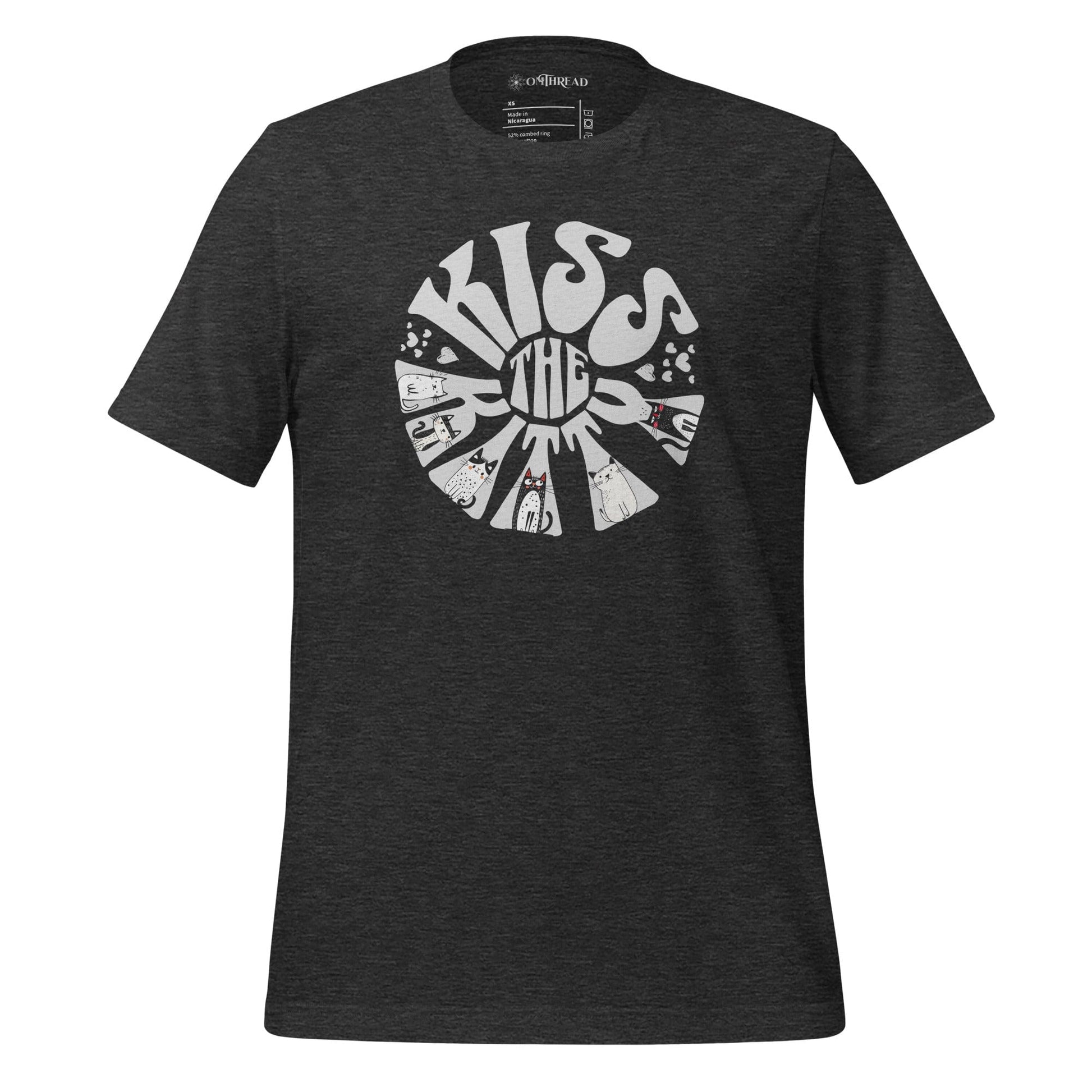 Dark gray t-shirt with a circular, retro-style design that reads 'Kiss the Kitty.' The letters form a sunburst shape with playful illustrations of various cats integrated into the text and surrounding shapes.