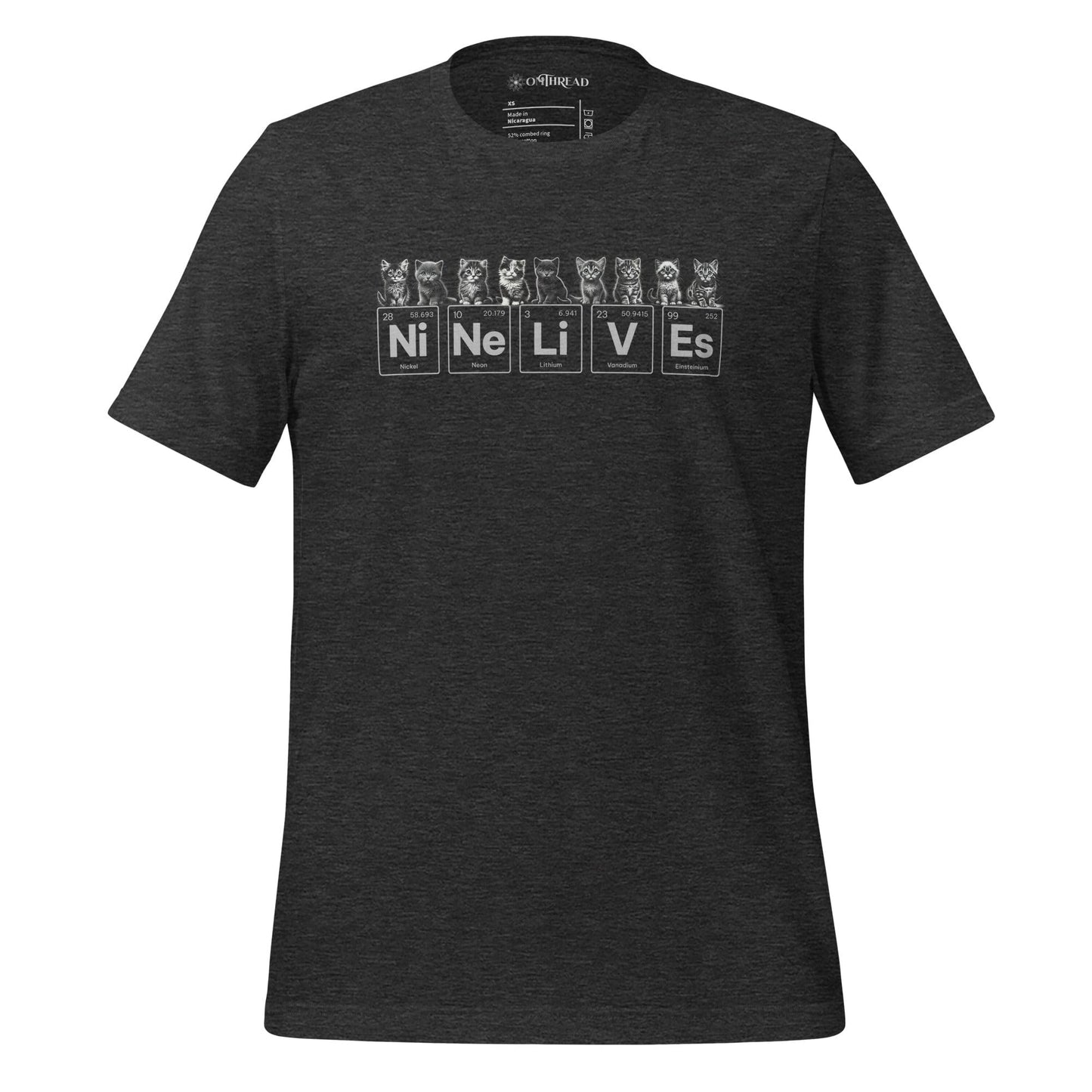 A dark gray t-shirt featuring nine illustrated kittens, each with playful expressions, sitting above periodic table elements that spell 'Ni Ne Li V Es' (Nickel, Neon, Lithium, Vanadium, and Einsteinium), representing 'Nine Lives.