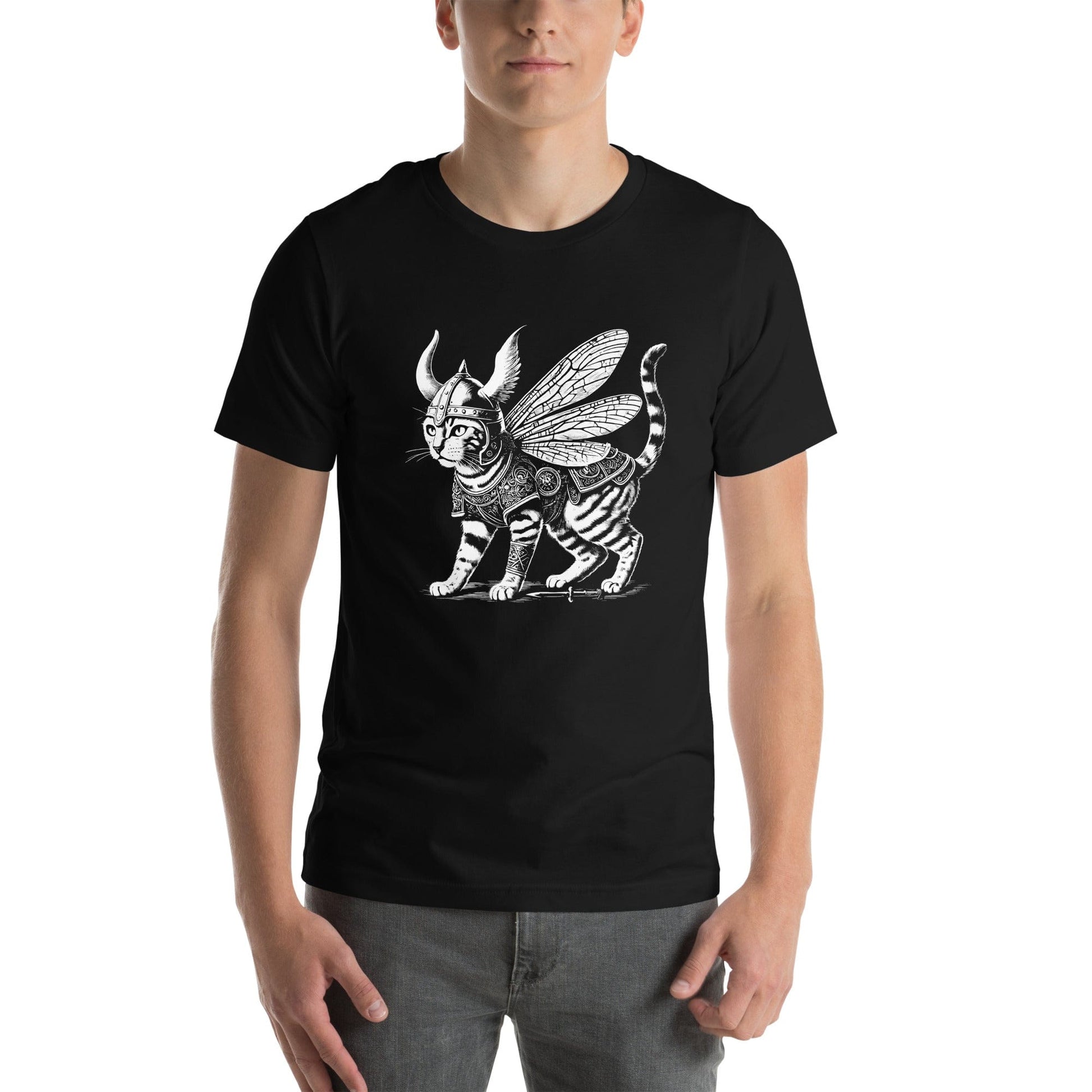 A man wearing a  black  t-shirt featuring a detailed illustration of a cat dressed as a Viking warrior, complete with armor, horned helmet, and insect-like wings. The cat stands confidently with intricate linework and patterns enhancing the design.