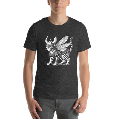 A man wearing a dark gray t-shirt featuring a detailed illustration of a cat dressed as a Viking warrior, complete with armor, horned helmet, and insect-like wings. The cat stands confidently with intricate linework and patterns enhancing the design.