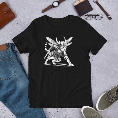 Black t-shirt featuring an intricate illustration of a cat dressed as a Viking warrior, wearing armor, a horned helmet, and insect-like wings. The cat is in a battle-ready stance, holding a sword with detailed linework and patterns.