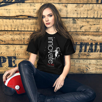 Woman wearing a black 'Innovate or Die' t-shirt with astronaut graphic, promoting a winning mindset and the importance of innovation – OMThread's motivational apparel.