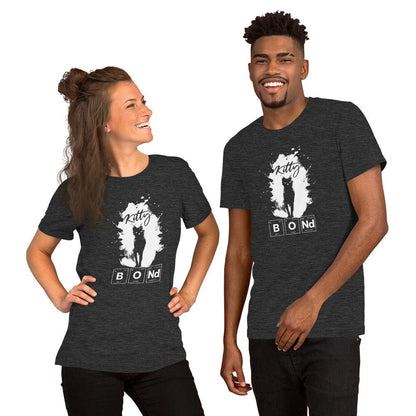 Man and woman wearing charcoal t-shirt featuring a silhouette of a black cat within a white paint splatter design. Above the cat, the word 'Kitty' is written in cursive, and below, 'BOND' is spelled out using periodic table elements: Boron (B), Oxygen (O), and Neodymium (Nd).