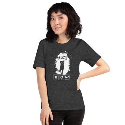 Charcoal t-shirt featuring a silhouette of a black cat within a white paint splatter design. Above the cat, the word 'Kitty' is written in cursive, and below, 'BOND' is spelled out using periodic table elements: Boron (B), Oxygen (O), and Neodymium (Nd).