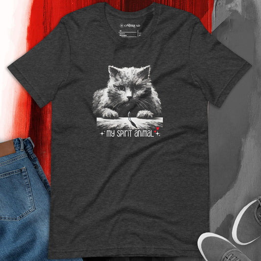 OMTHREAD dark gray t-shirt featuring a detailed illustration of a large, mystical long-haired cat watching over a lone traveler with the phrase "My Spirit Animal" in stylized text.